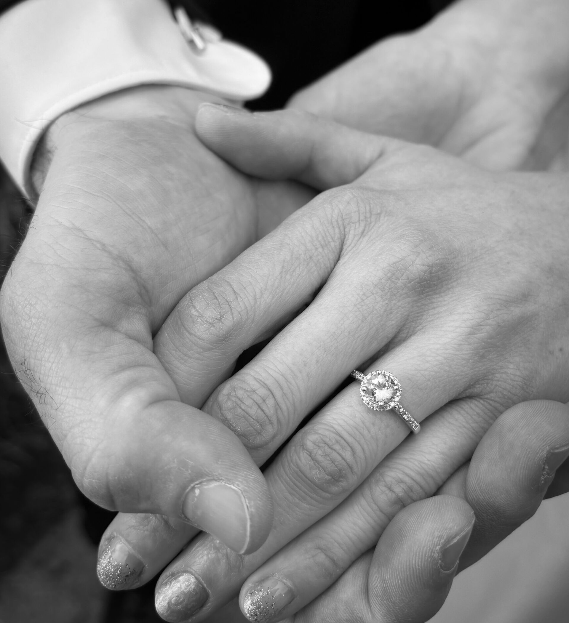 hands-engagement-ring Brianna and David holding hands