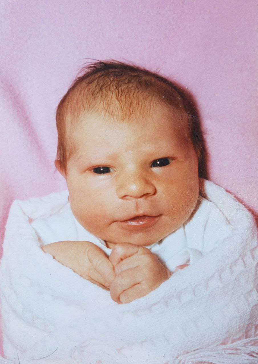 Baby Bree wrapped up in a blanket