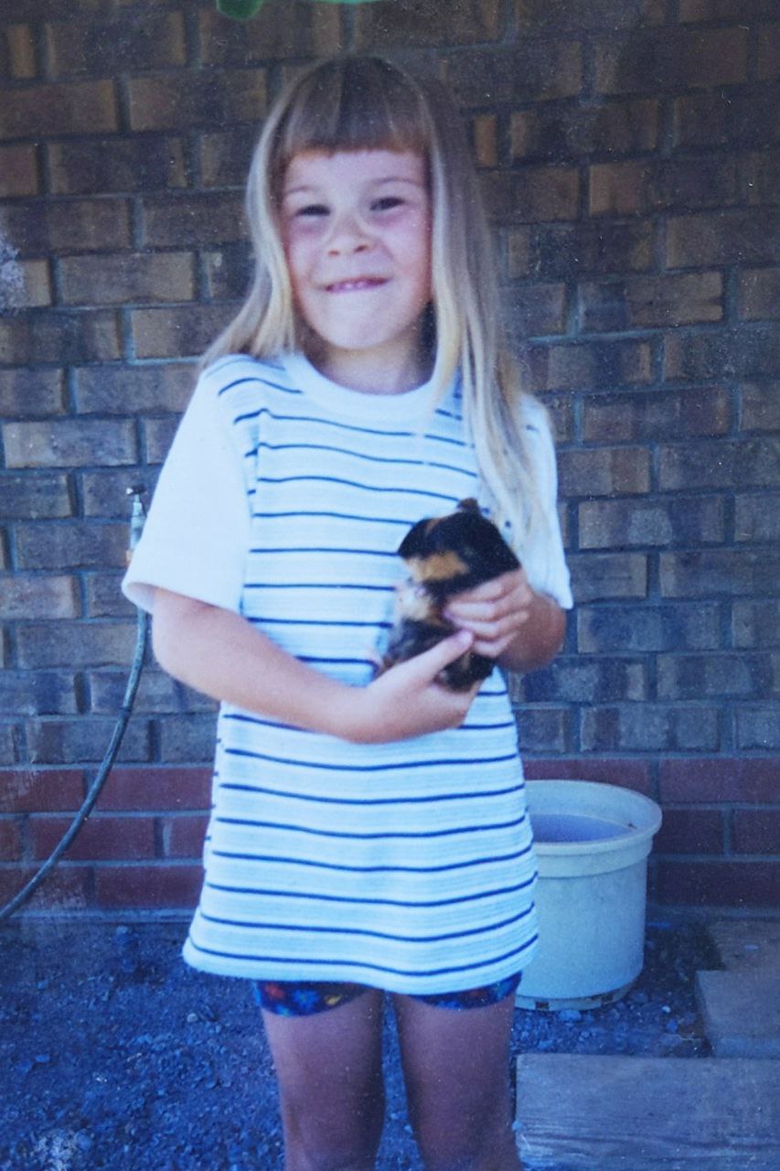 Bri with a baby dog.